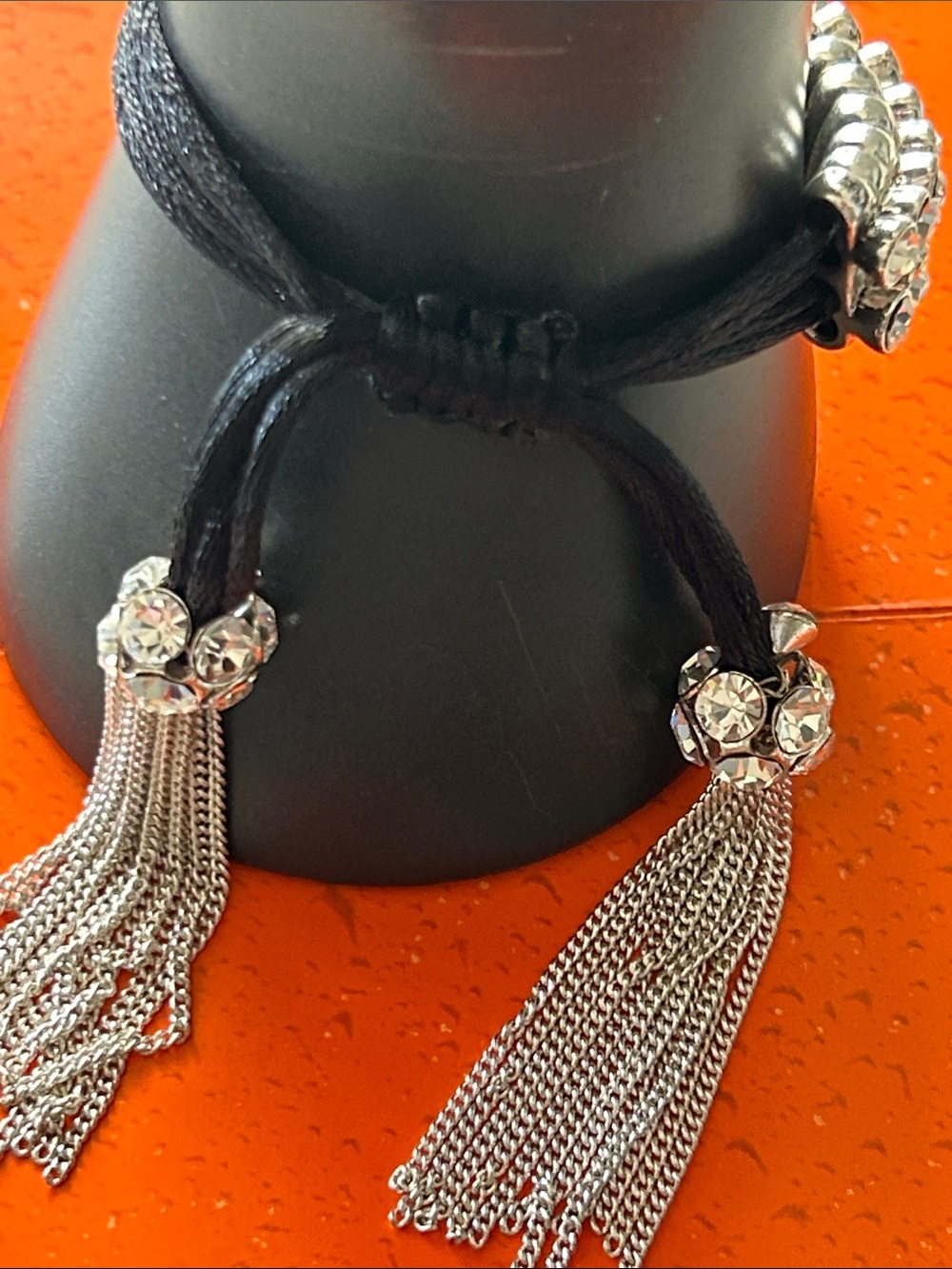 Betsey Johnson Crystal Black Sayin Cord Disco Ball & Tassel Bracelet